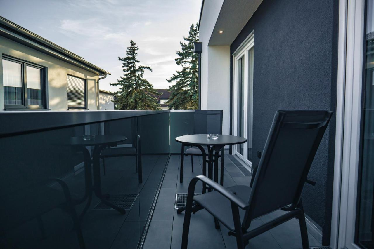 Aparthotel Boardinghouse Karlsdorf-Neuthard Extérieur photo